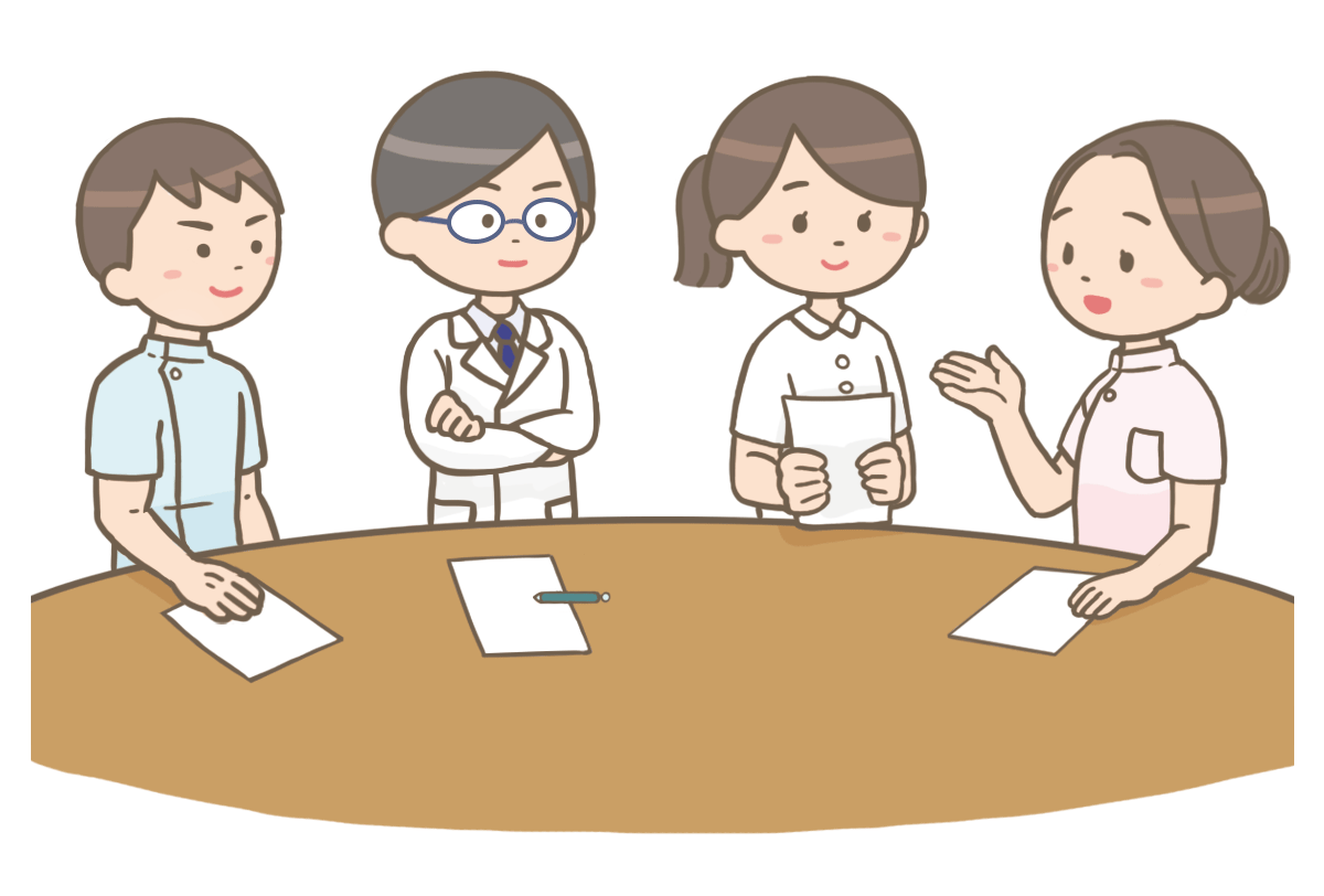 様々な医療関係者がカンファレンスしている様子